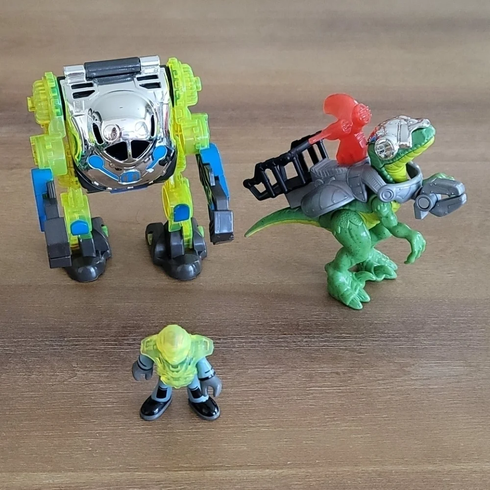Fisher-Price Imaginext Raptor Doc & Exo Suit Dinosaur Figure Toy Set
